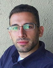 Headshot of Justin C Alimaras